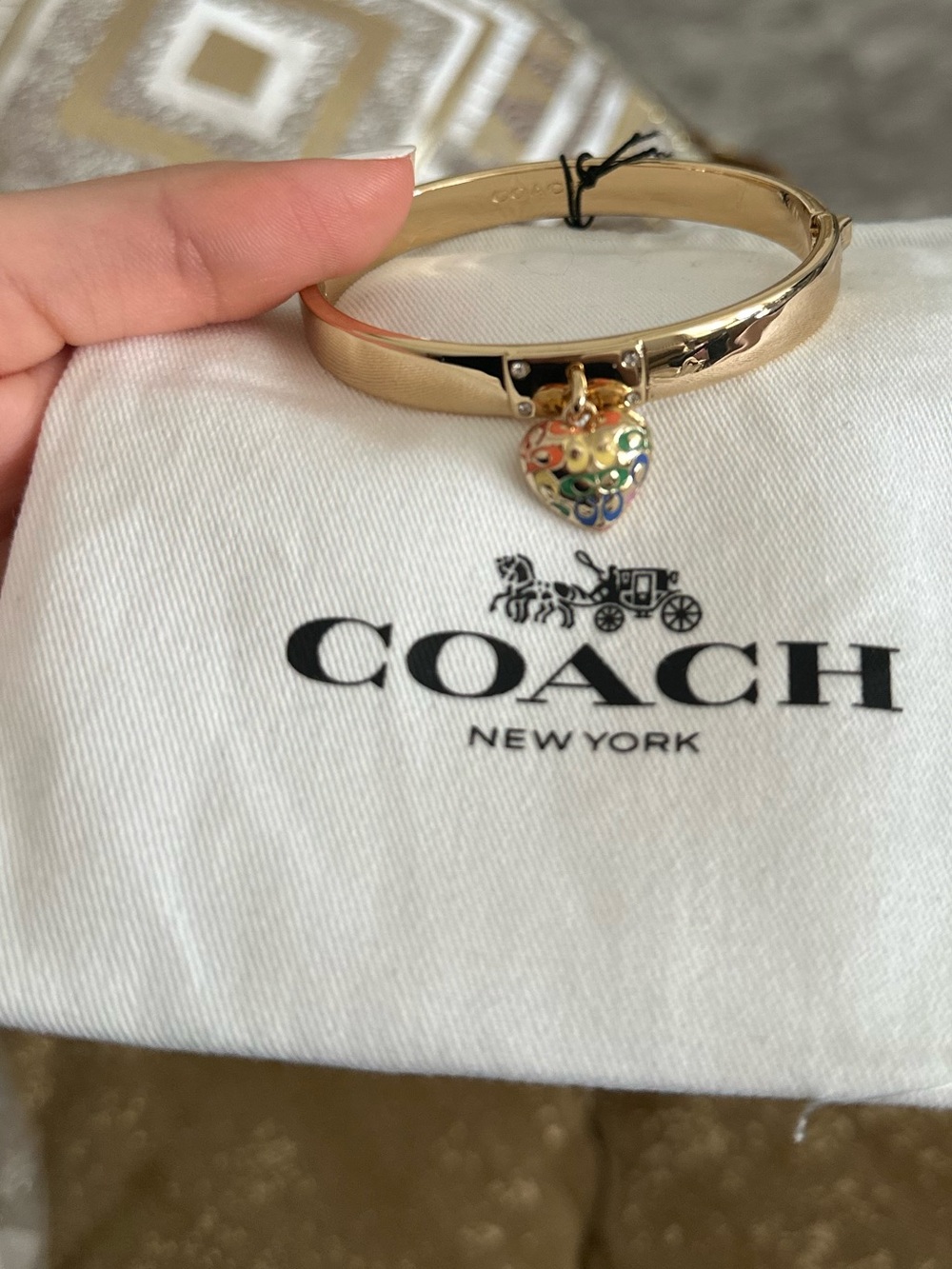 Coach Gold-Tone Bangle with Multicolor Enamel Heart Charm